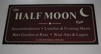 Half Moon pub sign.